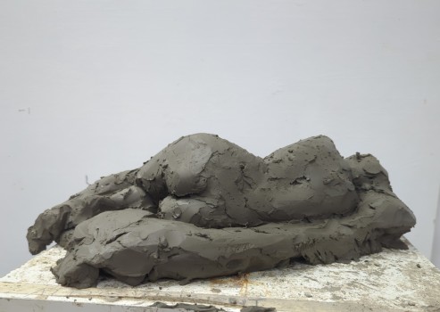 Liggend naakt, klei, 30cm